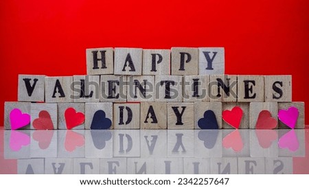 Happy valentine's day on wooden blocks
