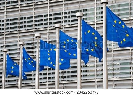 Waving European Union flags in a row in Brussels, Belgium. Close up Royalty-Free Stock Photo #2342260799