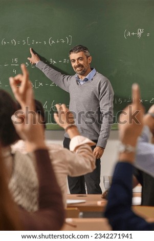 Math teacher giving lessons. Classroom with students. School education Royalty-Free Stock Photo #2342271941