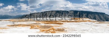 A panorama photo of Vibrant Colors of Mammoth Hot Spring, Yellowstone