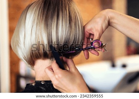 Closeup of a female bob haircut Royalty-Free Stock Photo #2342359555