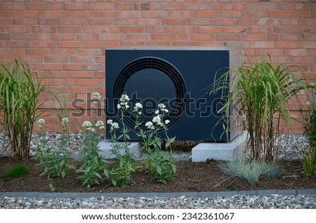 air-source heat pump for a moderate sized home Royalty-Free Stock Photo #2342361067
