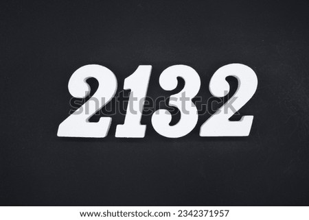 Black for the background. The number 2132 is made of white painted wood.