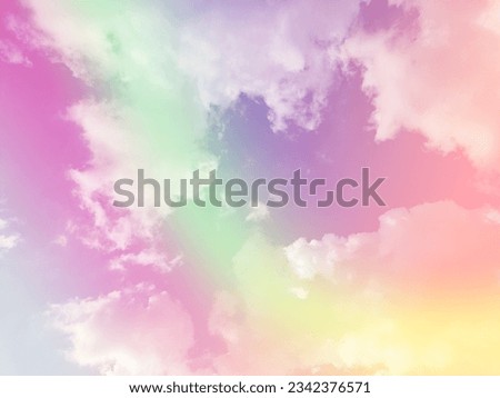 beauty abstract sweet pastel soft green and purple with fluffy clouds on sky. multi color rainbow image. fantasy growing light