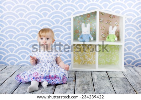 A girl with doll house 