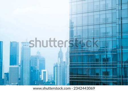 Refection of buildings on a skyscraper facade