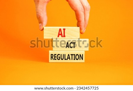 AI act regulation symbol. Concept words AI artificial intelligence act regulation on wooden block. Beautiful orange background. Businessman hand. Business AI act regulation concept Copy space