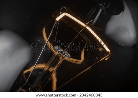 the incandescent filament of a light bulb Royalty-Free Stock Photo #2342460343