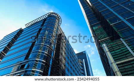 Modern business skyscrapers, high-rise buildings, architecture.  Concepts of financial, economics, future. London skyline , city escape at sunny day. Corporate building in London City, England, UK.  Royalty-Free Stock Photo #2342494055