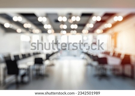 Modern Office Interior with Beautiful Lighting. Beautiful blurred abstract background of a modern office interior with beautiful lighting. Meeting background copy space template. Royalty-Free Stock Photo #2342501989