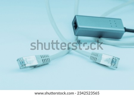A Ethernet RJ 45 LAN To USB in blue background