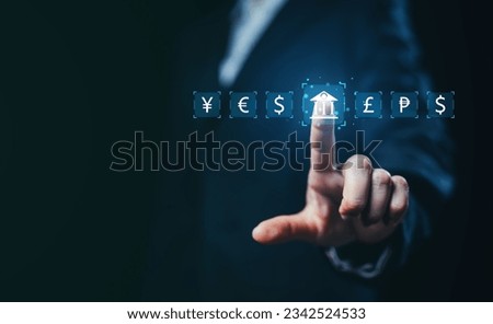 currency symbols. business man with currency symbols using hand touching on virtual screen monitor of Bank financial and currency symbols money swap credit