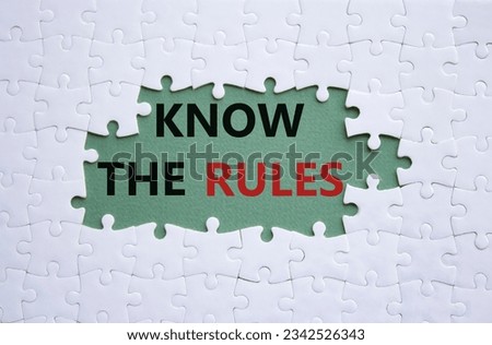 Know the rules symbol. White puzzle with words Know the rules. Beautiful grey green background. Business and Know the rules concept. Copy space. Concept word