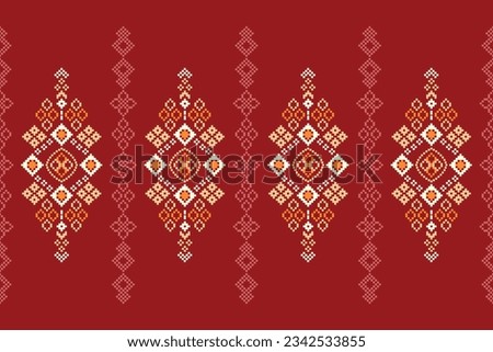 Ethnic geometric seamless fabric pattern Cross Stitch.Ikat embroidery oriental Pixel pattern red background. Abstract,vector,illustration. Texture,Cross Stitch,frame,decoration,motifs,wallpaper.