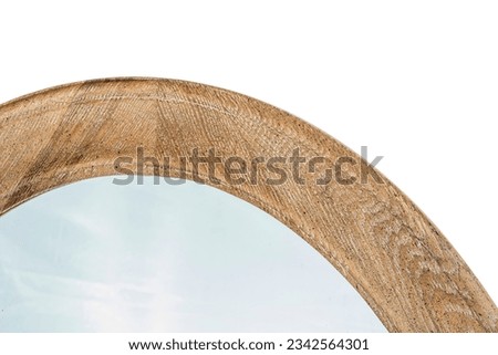 mirror in a wooden frame made of natural wood, an object isolated on a white background
