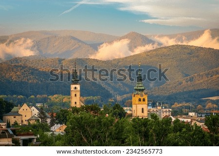 The town of Banska Bystrica surrounded by mountains in central Slovakia Royalty-Free Stock Photo #2342565773