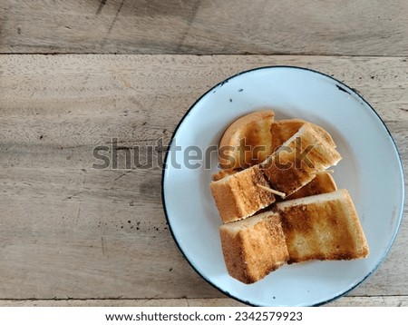 Food background pictures .Toast bread background image on white zinc plate.