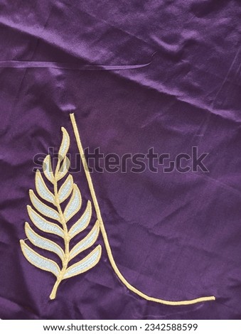 Beautiful design with contrast colors on violet color fabric. 