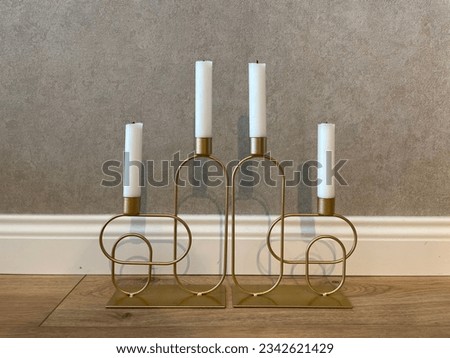 
Stylish candlestick with white candles