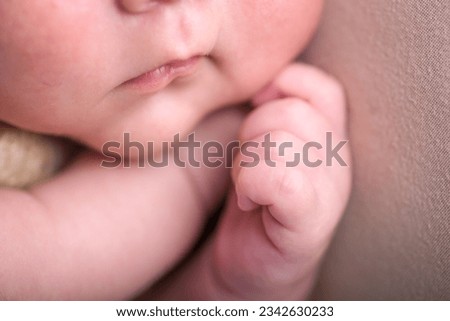 Newborn baby details macro photography toes fingers head lips ears Royalty-Free Stock Photo #2342630233
