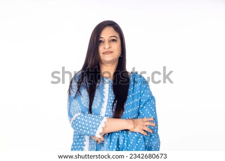 Confident indian woman smiling and giving happy expression.