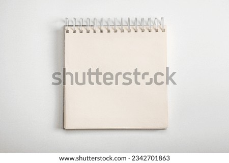 mockup notebook. Spiral notebook from top view with blank white space. close up flat lay mock up view photo of clear spiral notepad with copy space for design