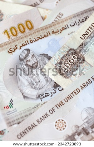New UAE banknotes banknotes of one thousand, paper money closeup in a vertical format. High quality photo.