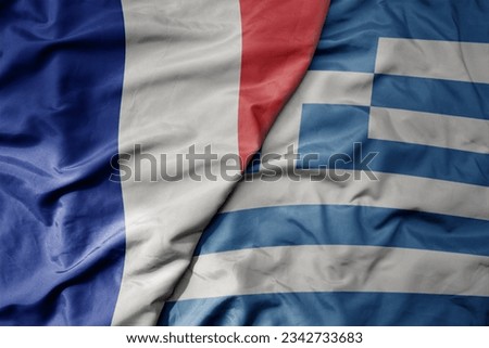 big waving realistic national colorful flag of france and national flag of greece . macro