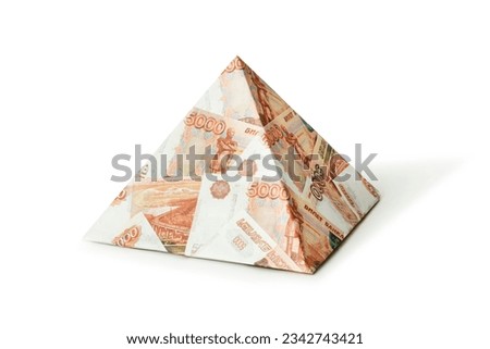 a pyramid scheme isolated on a white background. The concept of exchange in financial markets is the collapse of the financial system of capitalism. ruble pyramid scheme. Fraud in Russia. Royalty-Free Stock Photo #2342743421