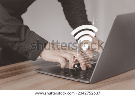 User use a computer laptop for a login password to wifi but wifi is not connected. Explore the seamless world of technology as user log in to WiFi. Concept technology of waiting to connect to wifi. Royalty-Free Stock Photo #2342752637