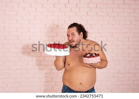 Funny fat man eats different goodies.