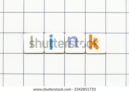 Colorful tile letter in word link on white grid background