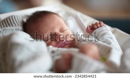newborn baby sleep. boy infant sleep lies in child bed. happy family birthday closeup baby lifestyle concept. cute baby close up sleeping in bed at home Royalty-Free Stock Photo #2342854421