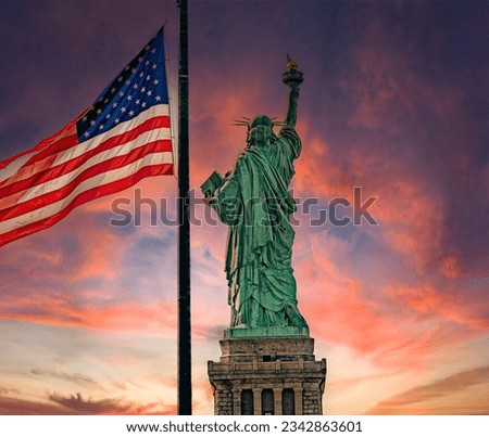 Statue of Liberty with waving flag in New York City, USA