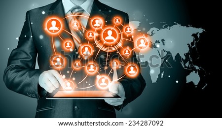 Business man using tablet PC. conceptual image of social connection