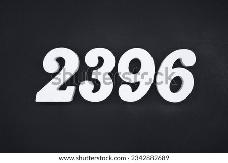 Black for the background. The number 2396 is made of white painted wood.
