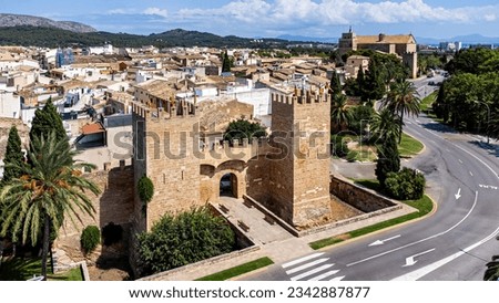 Aerial view of the gate of San Sebastian in the walls of the medieval city of Alcudia on the Balearic island of Majorca (Spain) in the Mediterranean Sea Royalty-Free Stock Photo #2342887877