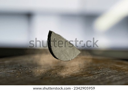 LK-99 room-temperature levitating superconductor. High quality photo Royalty-Free Stock Photo #2342905959