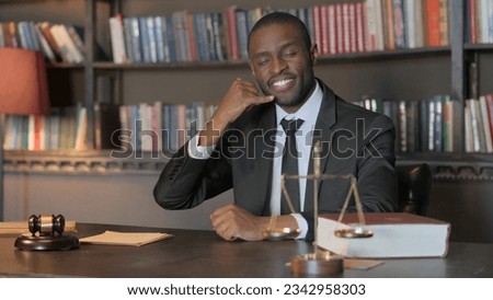 Call Me Gesture by African American Lawyer in Office