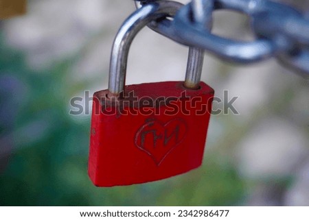          A bridge adorned with romantic padlocks, each symbolizing a heartfelt bond, captures the essence of everlasting love and commitment, an enchanting tableau of affection.                       Royalty-Free Stock Photo #2342986477