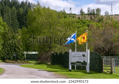 Scottish flags by the road at the spring Highlands