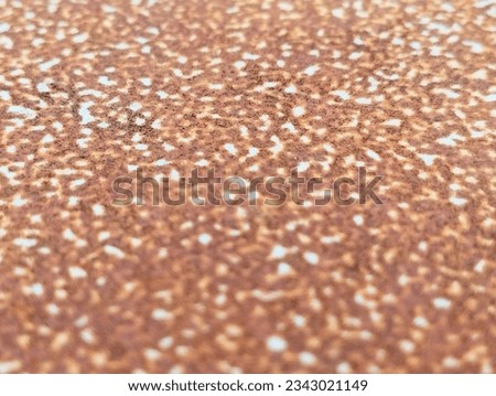 dirty brown stained metal surface as background template for PowerPoint presentation 