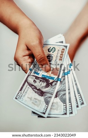 hands handing out money, on a white background