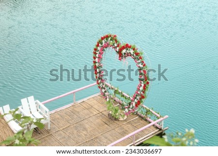 Spot photos with additional love-shaped ornaments at Telaga Biru Cisoka (Cisoka Blue Lake)