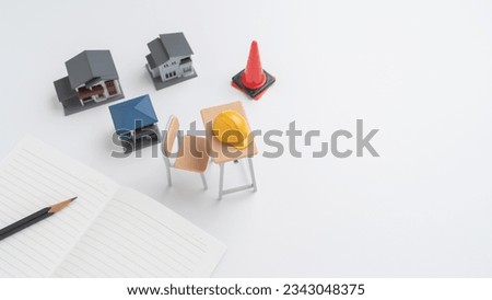 Study tools and a model house.