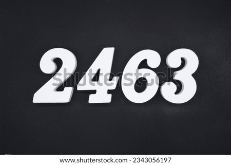 Black for the background. The number 2463 is made of white painted wood.