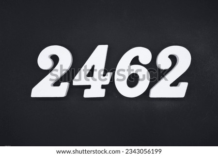 Black for the background. The number 2462 is made of white painted wood.