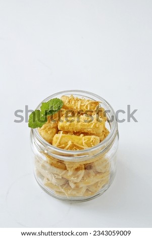 cheesecake or kastengel in a round jar with a white background. empty space for the watermark 