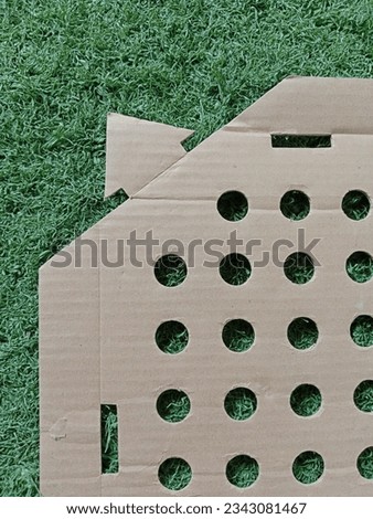 perforated garden on plastic turf