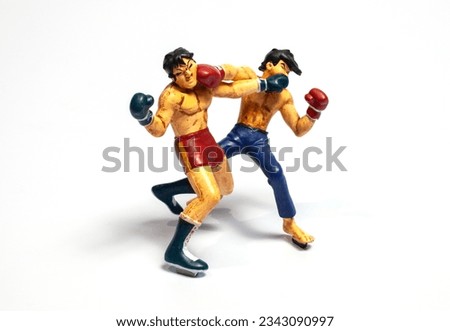 boxer fighting toy on white background